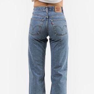 levi 569 size 25 waist (fits a 00, 0 and 1), 27 length. medium-dark wash